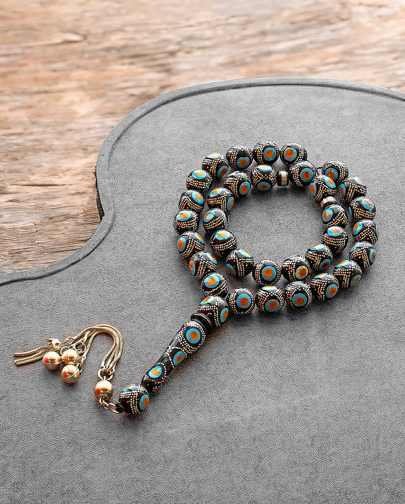 Silver-toned amber-like and turquoise-embellished rosary