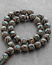 Silver-toned amber-like and turquoise-embellished rosary